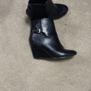 Black wedge heel boots